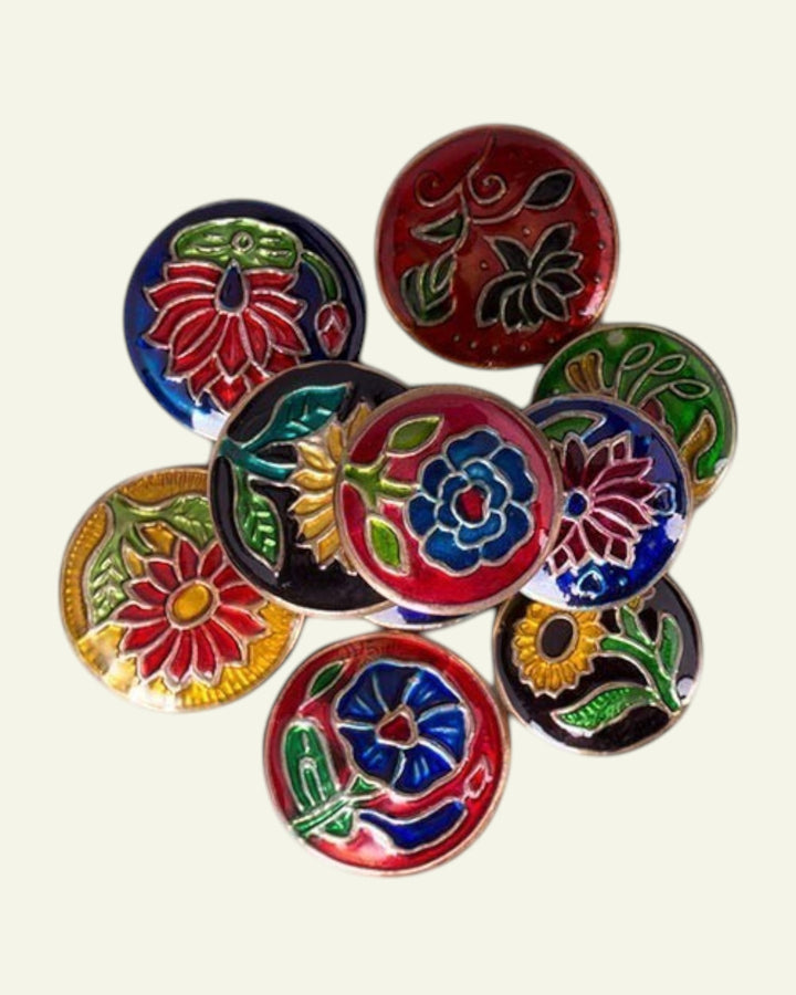 ULA assorted floral enamel tin lids for creme perfume. Designs include lotus, rose, sunflower, and more in vibrant colors.