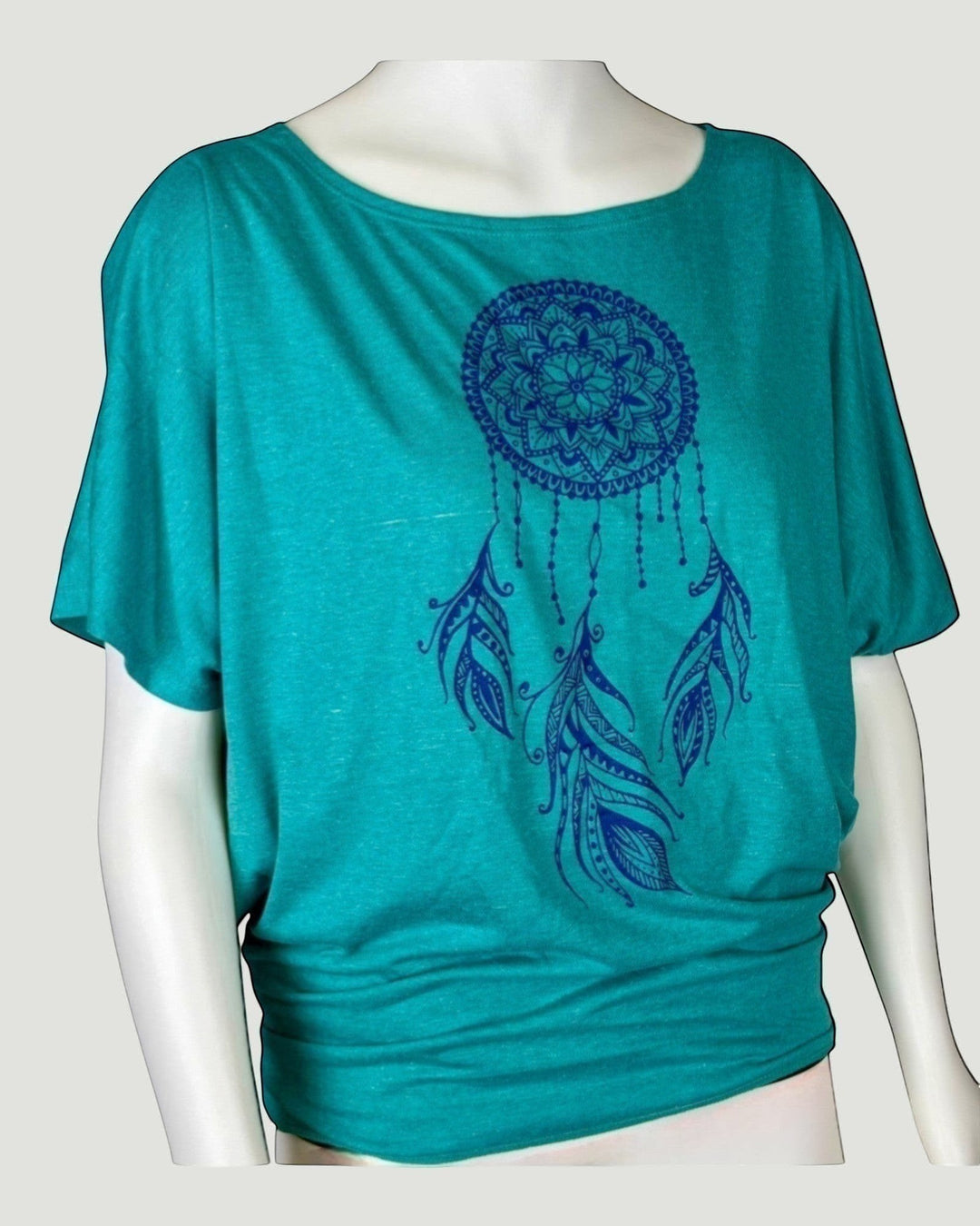 ULA 'Hot' Batwing Top in Aqua Sea with a blue dreamcatcher print. Soft, breathable fabric with dolman sleeves.