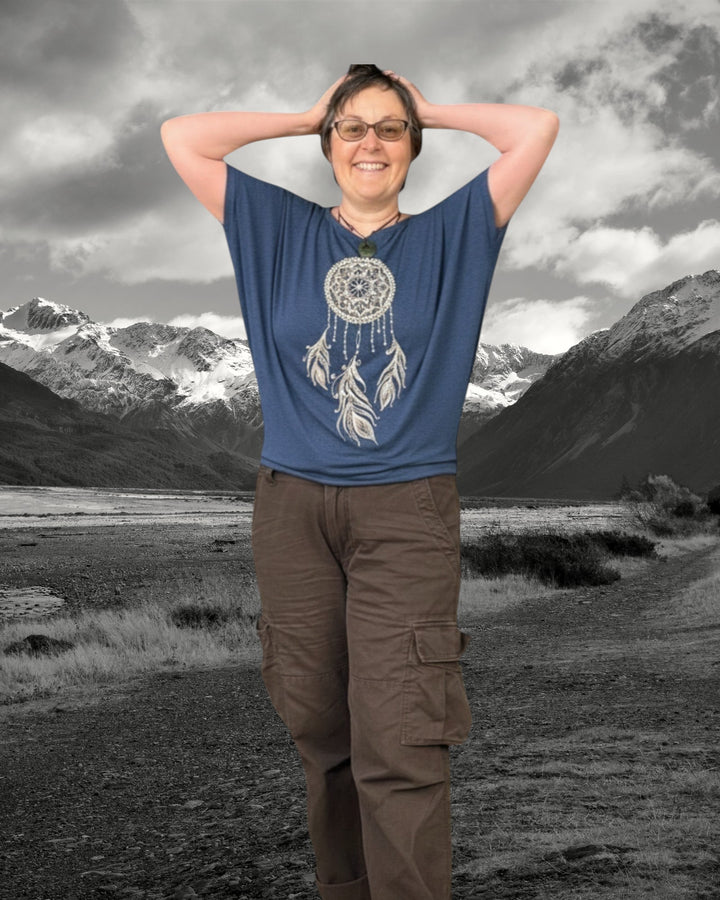 ULA women's blue batwing top with dreamcatcher graphic, short sleeves, and relaxed fit.