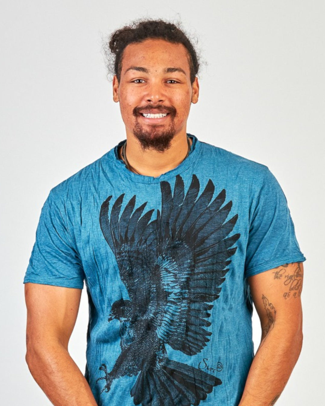 ULA men's blue cotton t-shirt with large black eagle print and crew neck.