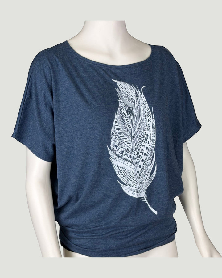 ULA dark blue batwing top with a white ornate feather graphic print. Short sleeves, relaxed fit.