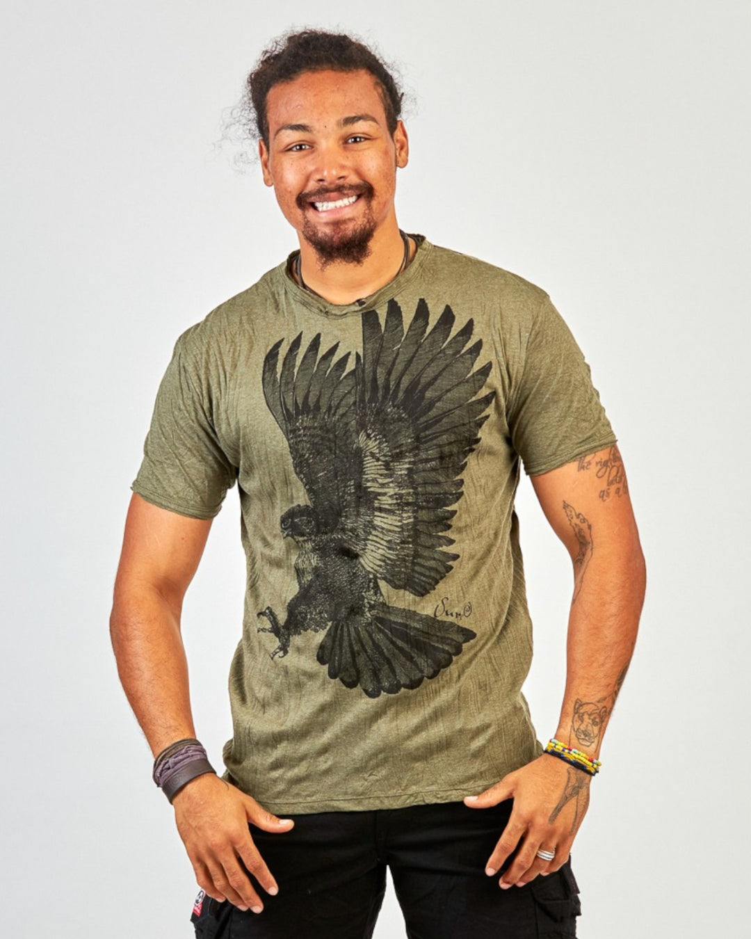 ULA men's olive green cotton t-shirt with a large black eagle print and crew neck.