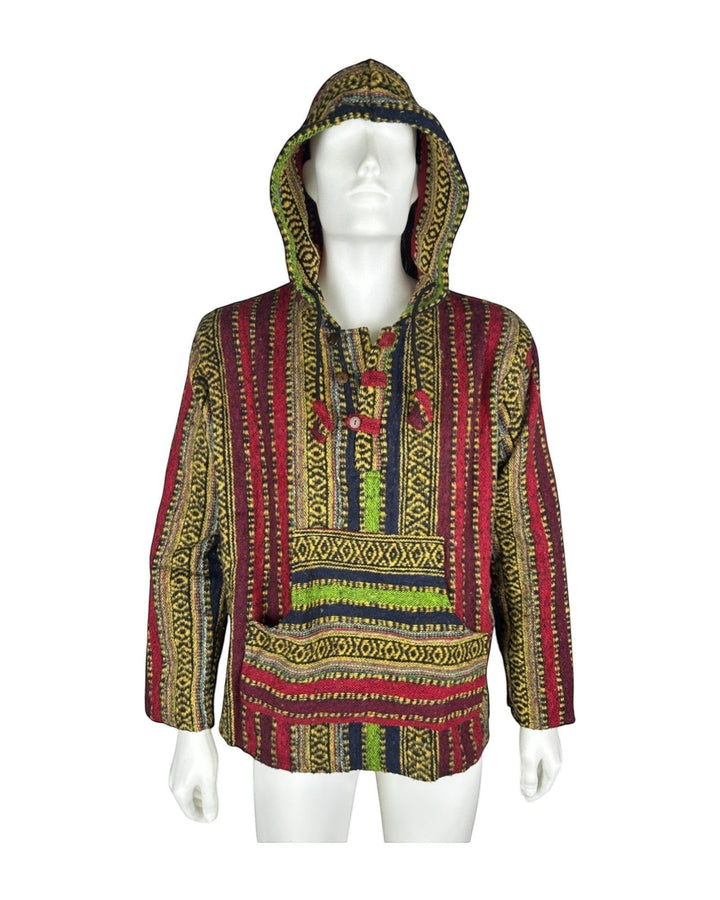 ULA Traveller pullover, a woven 100% cotton hooded jacket with a colourful striped pattern in red, yellow, green, and blue, featuring a front pocket and toggle buttons.