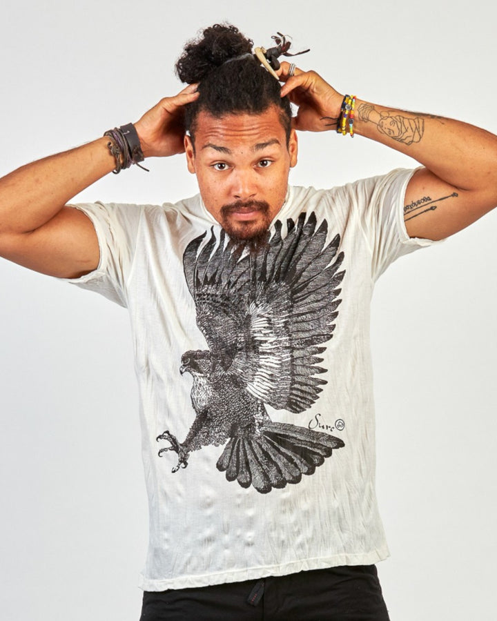 ULA white cotton t-shirt with a large black eagle print and a crew neck. Comfortable fit, ideal for casual wear.